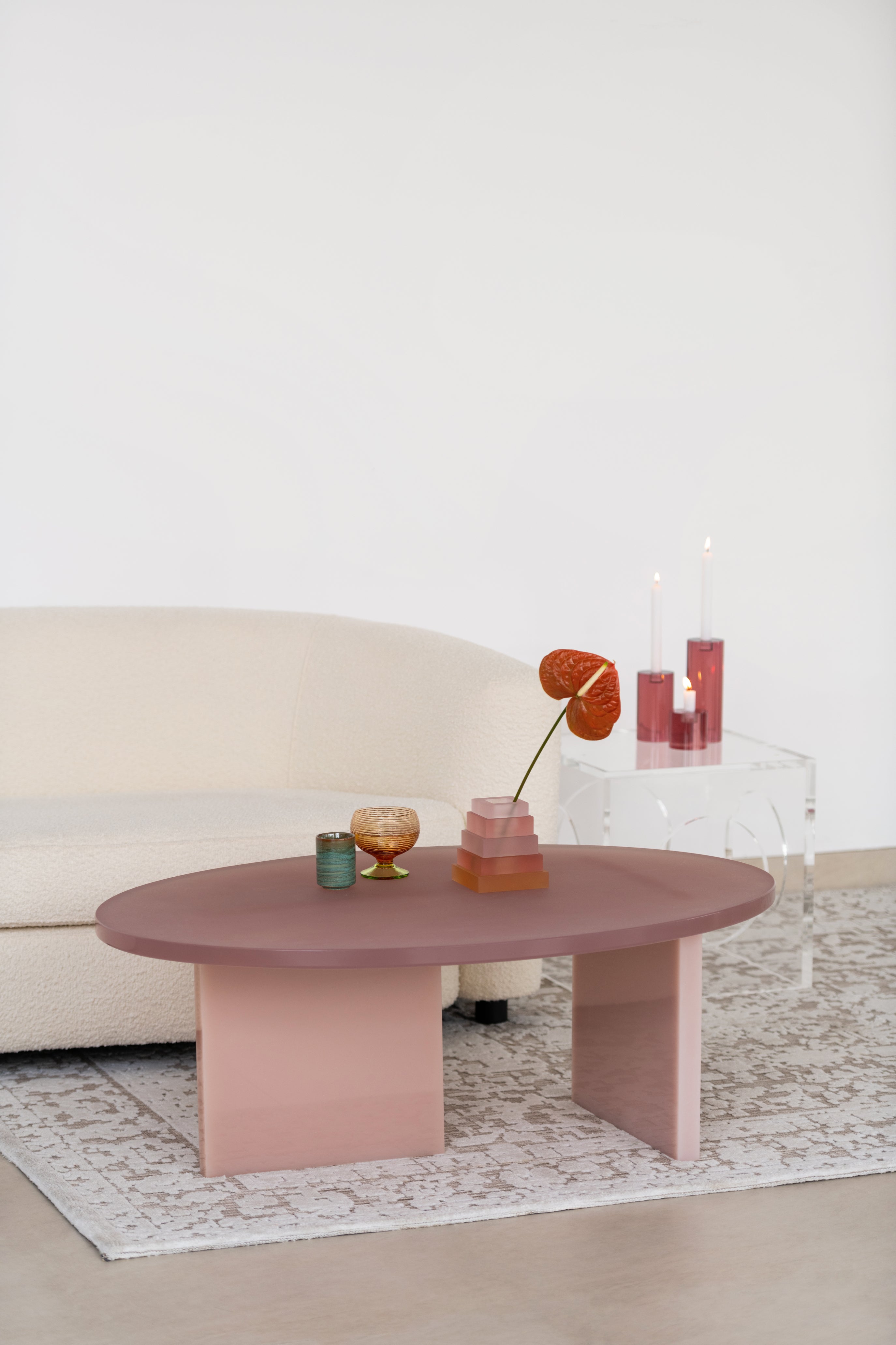 The OVAL resin pink coffee table